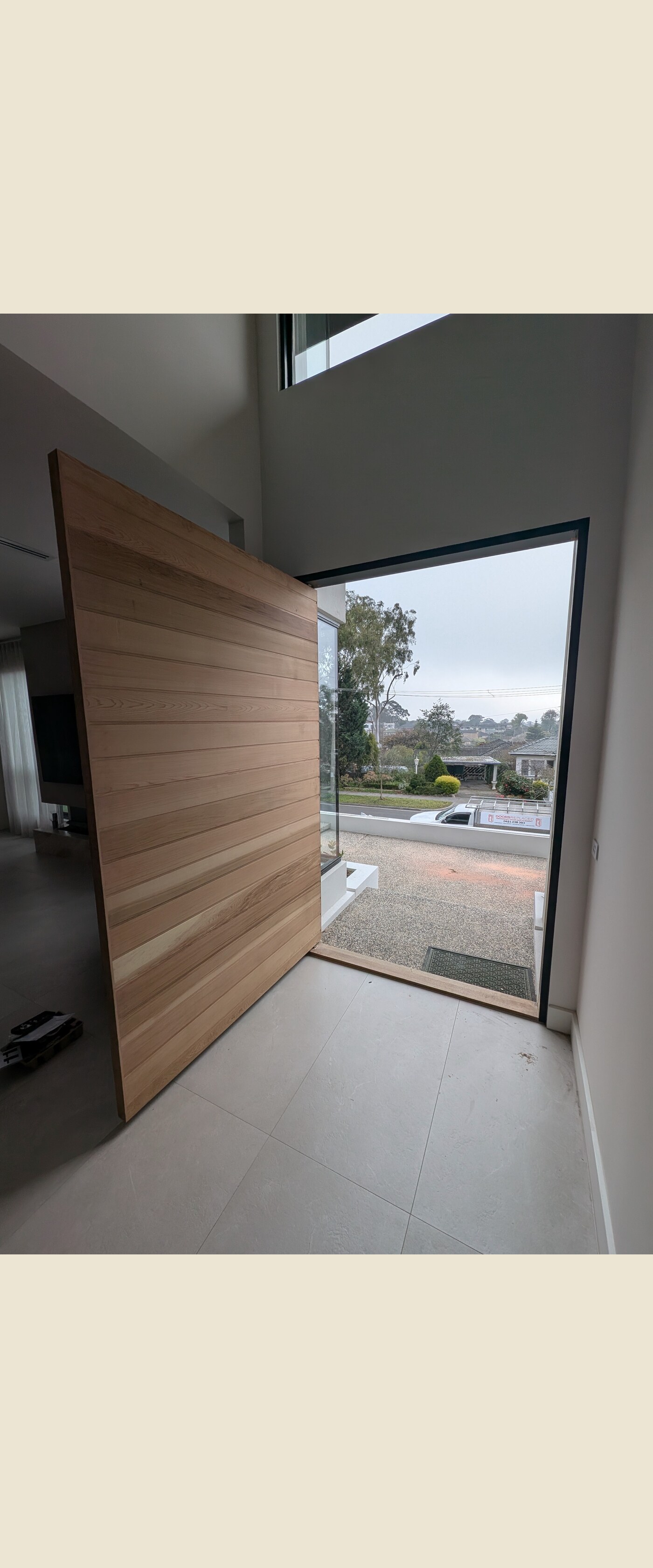Custom bespoke entrance — Western Red Cedar oversized pivot, Balwyn